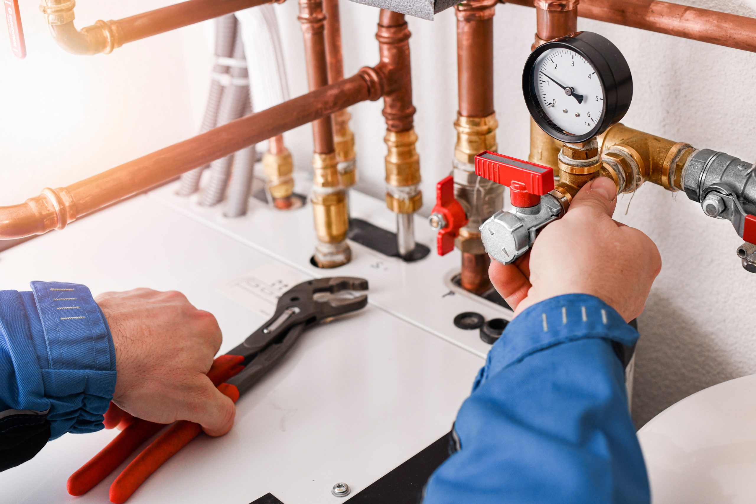 Plumber working with tools Plumber working with tools